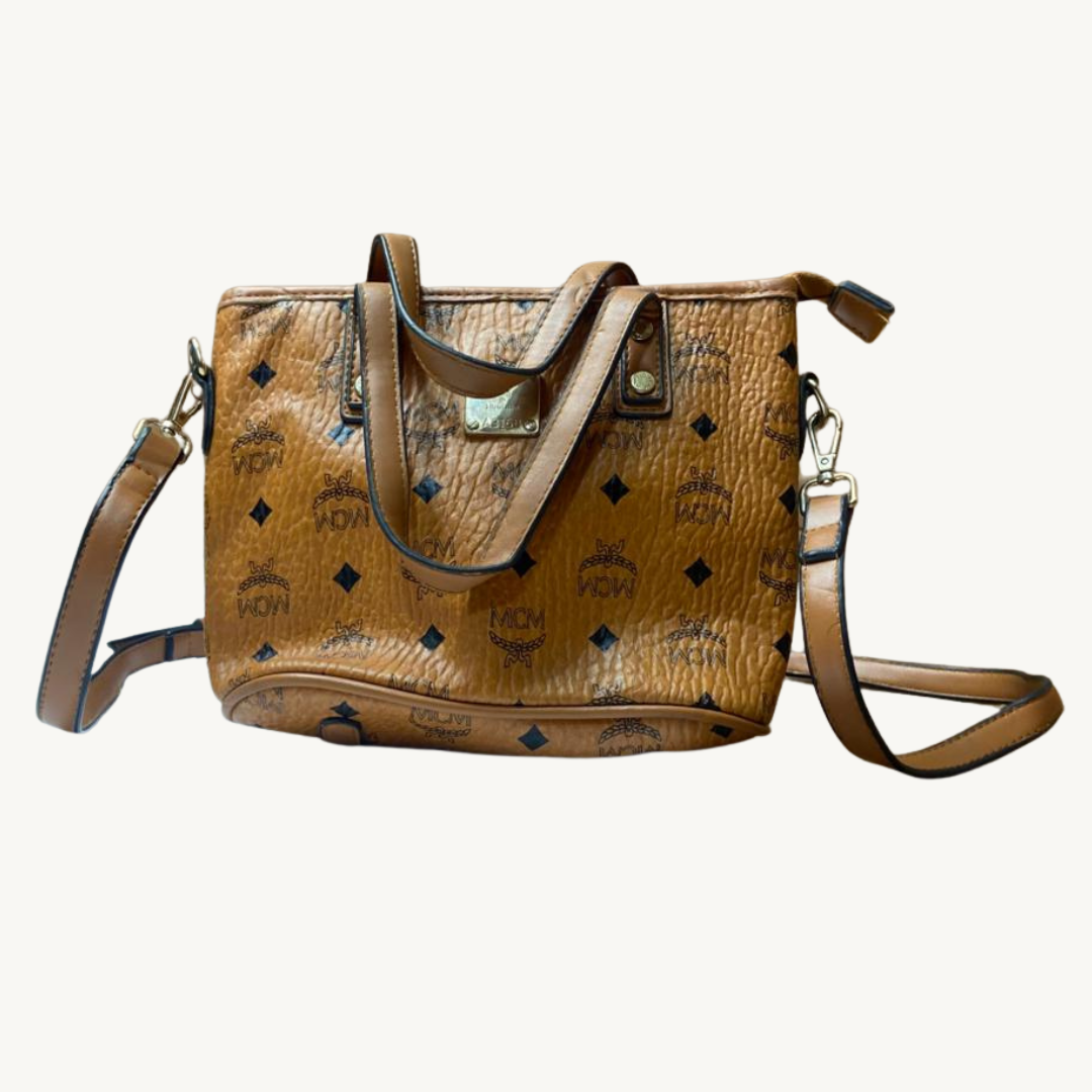 Bolso Mini Tote MCM Munchen en Lona Visetos Cognac con Correa Bandolera